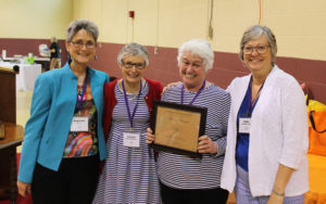Marian Bennett, second from right, poses with her certificate recognizing her as an honorary graduate of Mount Saint Joseph Academy. Marian retired in 2018 after 14 years as coordinator of Ursuline Partnerships, in which she helped produce Alumnae Weekend. Pictured with her are the Alumnae Association officers, from left, Stephanie Warren, present; Carolyn Drury McCarty, secretary and Paula Chandler Gray, vice president and treasurer.