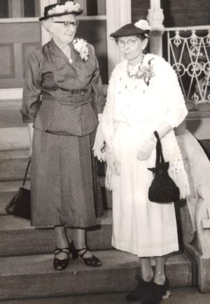 Mary Willie Wight-Spalding (left) standing next to fellow 1905 alumna Jessie Lee Wimsatt.