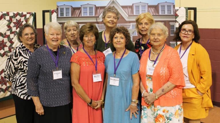 Class of 1966, first row from left, Sister Suzanne Sims, Mary Rose Murphy Riney, Mary Margaret Drury, and Elaine McCarty Glenn; second row from left, Mary Lou Byrne Payne, Phyllis Costello Bresnik, Cecilia Robinette McEldowney, Susan Thomas Allgeier and Dolores Biddle Lundy.
