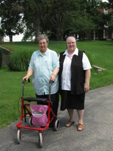 Sister Ruth and Sister Catherine Marie stood outside of Saint Ursula Hall to pose for a new picture on June 25, 2013.