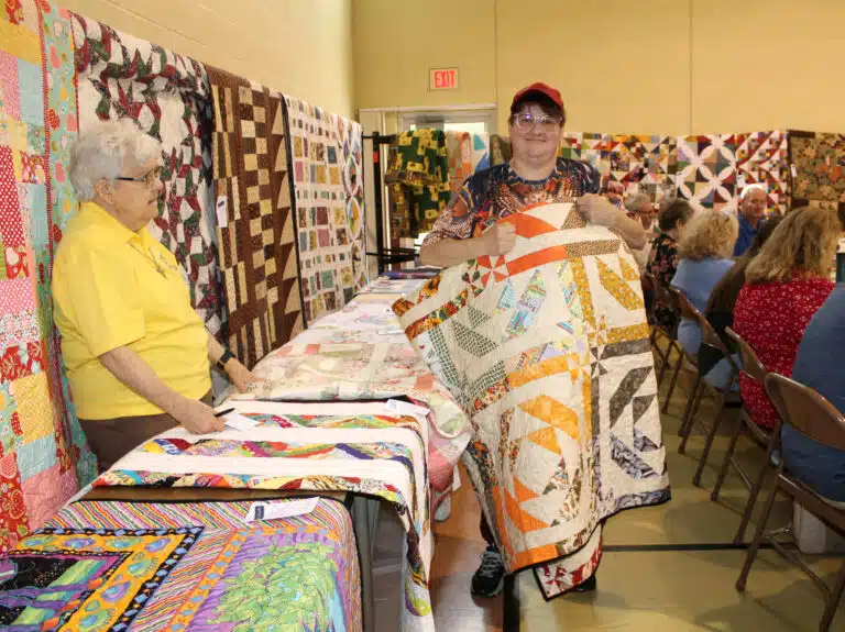 Sally Fitzgerald, one of the Ursuline's quilting friends, chose Disappearing Pinwheel Illusion. Sally Fitzgerald, one of the Ursuline's quilting friends, chose Disappearing Pinwheel Illusion.