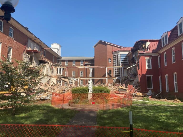 By 4 p.m. on April 18, 2023, most of the 1874 building was razed.