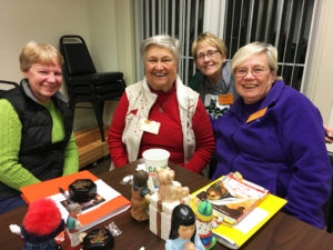 Dee Huber, left, of Louisville, is joined by her sister, Cheryl Leadbeater, far right, of Virginia Beach, Va. Between them are Elaine Wood, second from left, and Vickie Osborne.