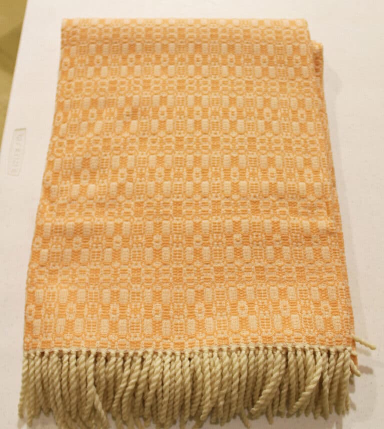 #69 Orange shawl; 41x74; $125