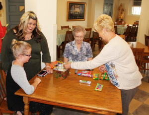 Ursuline Associate Carol Hill makes her purchase before the candy was all gone again.