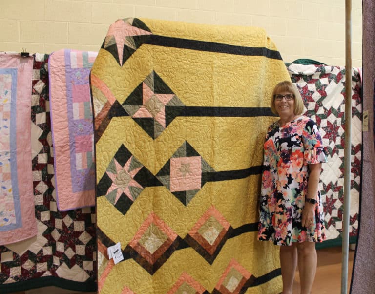 Alice Durbin of Calhoun, Ky., won a quilt in the inaugural Quilt Bingo in 2019, and won again this year. Her husband, Jamie, works in maintenance at the Mount.