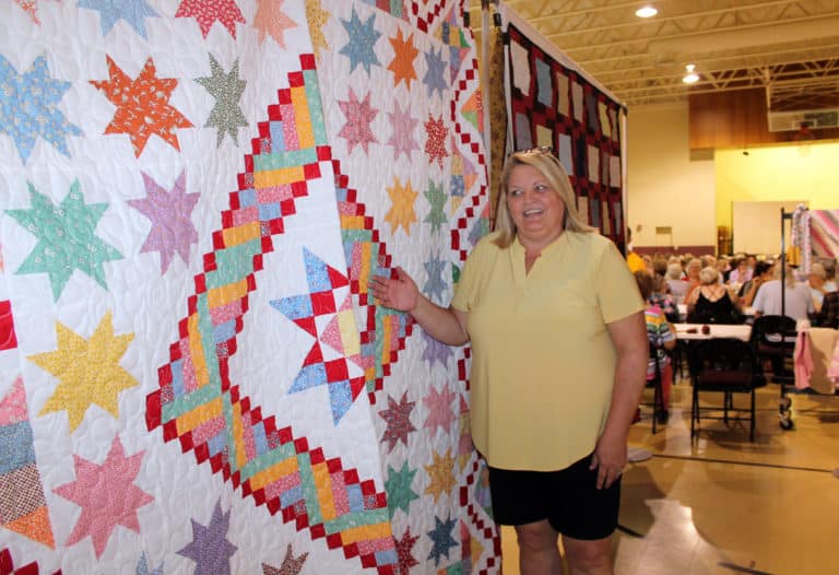 Angie Morris of Owensboro was all smiles with her new quilt.