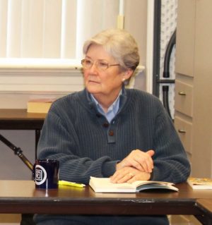 Anne Renfrow, who has attended previous book studies at the Center, listens as Sister Ann makes a point.