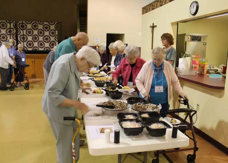 Going through the lunch line were Sister George Mary Hagan, left, and Sister Marie Joseph Coomes, right, with Sister Nancy Murphy right behind her. Going through the lunch line were Sister George Mary Hagan, left, and Sister Marie Joseph Coomes, right, with Sister Nancy Murphy right behind her.