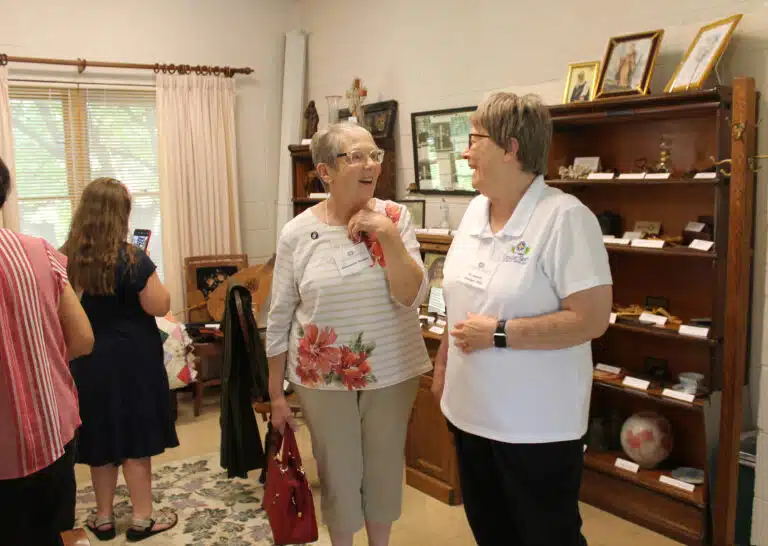 Associate Stephanie Render, left, shares a laugh with Sister Amelia Stenger during a visit to the Heritage Room in Lourdes Hall during Associates and Sisters Day. Associate Stephanie Render, left, shares a laugh with Sister Amelia Stenger during a visit to the Heritage Room in Lourdes Hall during Associates and Sisters Day.