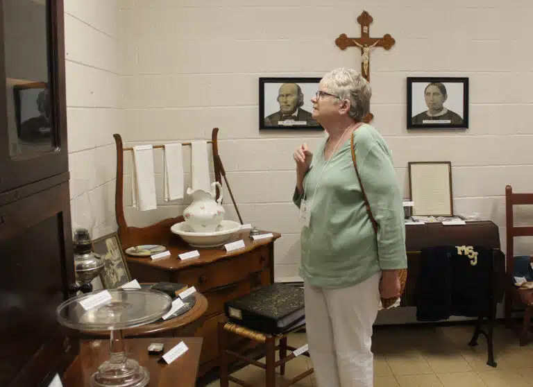 Associate Lois Bell looks at artifacts in the Heritage Room in the early afternoon of Associates and Sisters Day. Bell of Paducah has been an Ursuline Associate for 35 years. Associate Lois Bell looks at artifacts in the Heritage Room in the early afternoon of Associates and Sisters Day. Bell of Paducah has been an Ursuline Associate for 35 years.