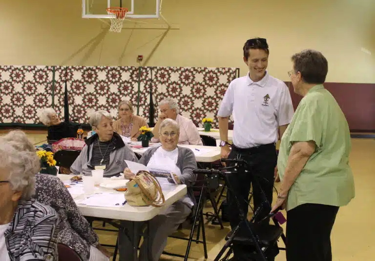 Associate Wes Wheatley talks with Sister Sharon Sullivan, right, during the Saturday event. Seated to his left are Sister Maureen O’Neill and Sister Karla Kaelin. Associate Wes Wheatley talks with Sister Sharon Sullivan, right, during the Saturday event. Seated to his left are Sister Maureen O’Neill and Sister Karla Kaelin.