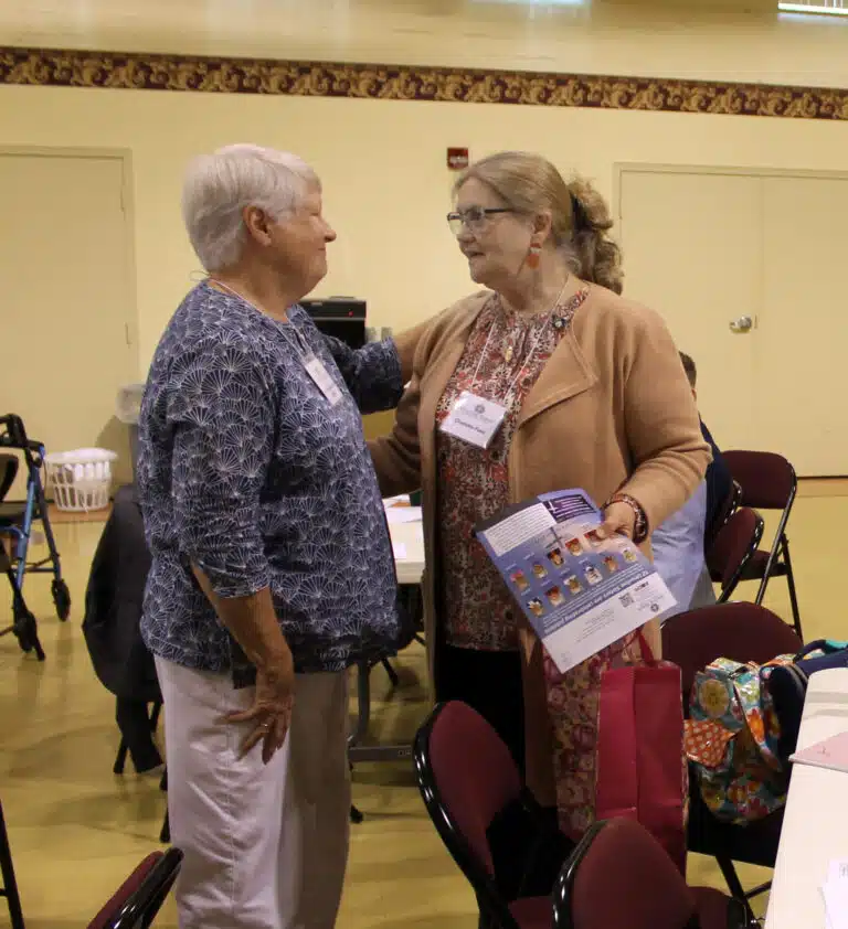 Sister Suzanne Sims speaks with Associate Charlotte Paez, who came with her husband, Associate Gustavo Paez, and her mother-in-law. Charlotte is a member of the Associate Advisory Board. Sister Suzanne Sims speaks with Associate Charlotte Paez, who came with her husband, Associate Gustavo Paez, and her mother-in-law. Charlotte is a member of the Associate Advisory Board.