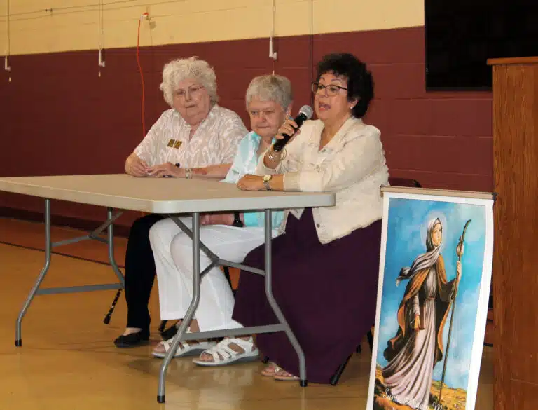 Lisa Steiner tells everyone that the Associates of the Ursuline Sisters of Louisville are active in their parishes, and they try to find a focus for their service as Associates. Lisa Steiner tells everyone that the Associates of the Ursuline Sisters of Louisville are active in their parishes, and they try to find a focus for their service as Associates.