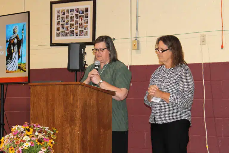 Sister Monica Seaton, a member of the Ursuline Leadership Council, left, led the opening prayer, along with Associate Tina Wolken of Owensboro. Sister Monica Seaton, a member of the Ursuline Leadership Council, left, led the opening prayer, along with Associate Tina Wolken of Owensboro.