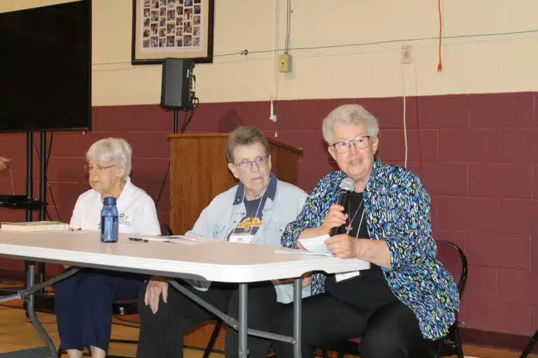 Sister Michele Morek, right, a member of the community's Laudato Si Committee, tells attendees about the Ursulines’ 10-year environmental plan. Sister Michele Morek, right, a member of the community's Laudato Si Committee, tells attendees about the Ursulines’ 10-year environmental plan.