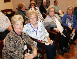The Bell sisters -- Sandi Boswell A67, Joyce Schulte A58, Faye Nix A55 and Joan Dant A53 – gather before Mass. They were in attendance to remember their sister, Martha Bell Johnson A65, who died in March 2016.