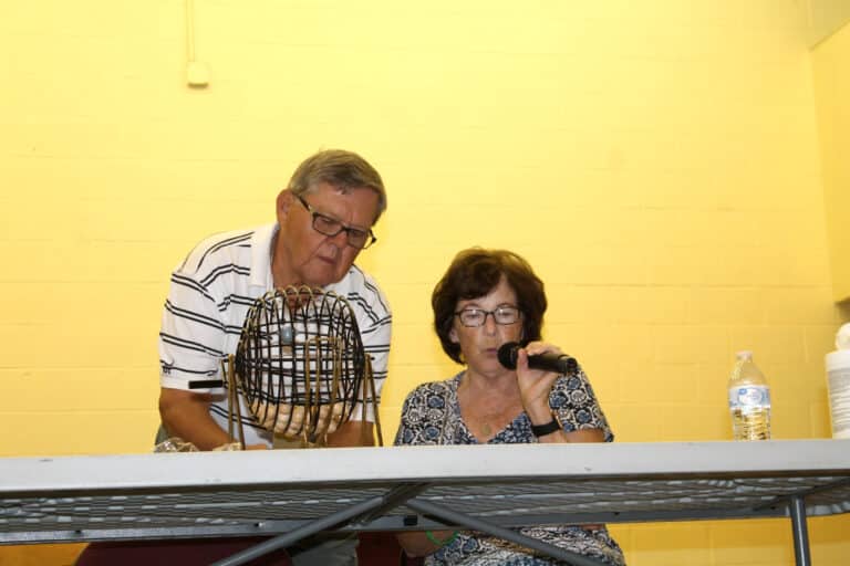Pat Stelmach, who graduated from Mount Saint Joseph Academy in 1968, served as the bingo caller, with help from her husband, Todd, who grew up at Maple Mount.