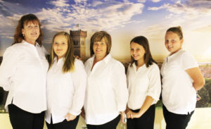 The leaders and some of the Young Daughters of Saint Angela group from Whitesville, Ky., volunteered at the gala. Here they took advantage of the “photo booth” in front of a picture of Brescia, Italy. Pictured, left to right, are Associate and YDOSA leader Doreen Abbott, Maggie Foster, co-leader Julie Foster, Paige Crabtree and Rayleigh Chaffin.