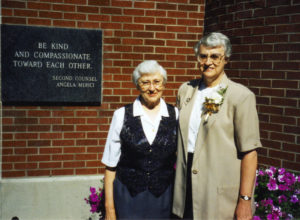 Sister Clarita, left, poses with her sister, Sister Marie Goretti in the piazza at the Motherhouse.