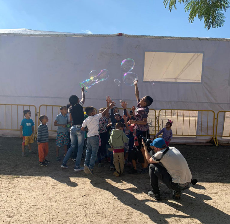 Children play with bubbles that were brought by a Canadian volunteer on Jan. 24.
