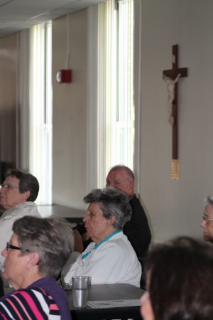 Sister Luisa Bickett, who served in Chile from 1965 to 1983, watches the presentation.
