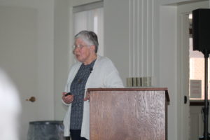 Sister Ruth Gehres welcomes the group and explains that the Ursuline Sisters moved into foreign missions when Pope John XIII asked that all North American religious communities send missionaries to Latin America.