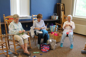 Left to right, Anne Presser, Hadley Harrington and Marilyn Baird are busy with their various knitting and crocheting projects during the retreat.