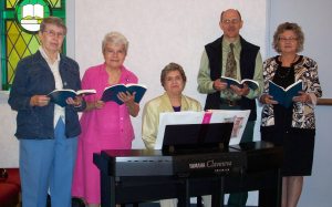 Sister Cecelia Joseph Olinger, second from left, selects and organizes the Sunday music for the choir at St. George Church in Van Buren, Mo. Pictured here are the choir members, from left, Sister Pat Murphy CSJ, Sister C.J., Louise McKeel, Ken Haberl and Lynna Biscoito.
