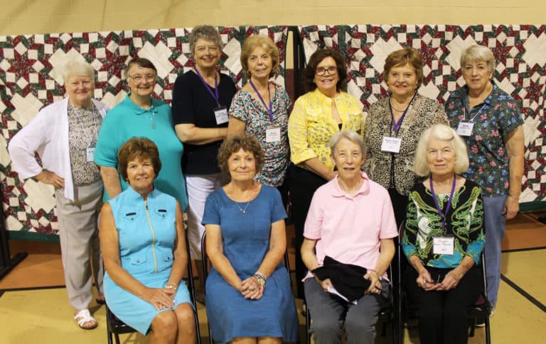The class of 1966 is, seated from left, Mary Murphy Riney, Mary Margaret Drury, Sister Maureen O’Neill and Peggy Kranz Romios; standing from left is Sister Suzanne Sims, Anna Mattingly, Cecilia Robinette McEldowney, Susan Thomas Allgeier, Dolores Biddle Lundy, Elaine McCarty Glenn and Phyllis Costello Bresnik.