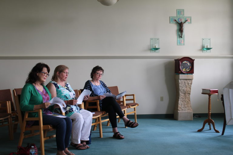 Stacy Green of Calhoun, Monica Krampe of Henderson, and Lea Vollmer of Evansville, Ind., take turns reading Psalm 95 on Saturday morning, June 15. The group gathered in the Retreat Center Chapel each morning for prayer as well as for vespers on Saturday at 5 p.m.
