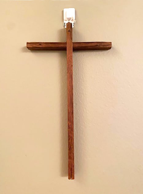 Sister Cheryl Clemons shared the story of this simple wooden cross: “I brought this simple wooden cross — with only 3 nails and a crack in the wood at the bottom — to the Mount with me when I entered the novitiate in January 1970. I don’t know when or how it entered my family home, but it was no longer being used and somehow it appealed to me. Without walls in the novitiate, I kept it on my bed pillow, but since then I’ve taken it with me everywhere I’ve been for the last 50-plus years. I always found a dual meaning in this cross which had ‘lost’ the corpus that belonged to it originally: it reminded me that Jesus was risen, but it also reminded me that there would be times I would be the one on that cross. Both of those truths have been woven into the fabric of my life. Today the cross hangs inside the doorway of the room that serves as my ‘chapel’ and my bedroom.”