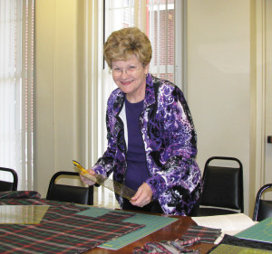 Diane Sutton works on a quilt that will be donated to a prison inmate.