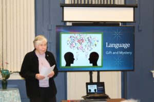 Sister Ruth explains that language is a diverse topic that has several meanings. One example she gave was Anne Sullivan, who helped Helen Keller, a blind and deaf child, learn to communicate. Keller later graduated from college and became a celebrity.