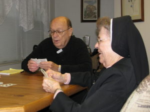 Sister Marie Brenda plays progressive rummy with Father Valentine Young, OFM, who came for a visit to the Mount in January 2009. Sister Marie Brenda served with Father Valentine in Houck, Ariz. “Father Valentine taught us this game, now everyone at the Mount plays it,” Sister Marie Brenda said at the time.
