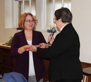 Sister Amelia Stenger, right, hands Jackie a retirement gift. Jackie said she had many friends at the Mount and loved everyone.