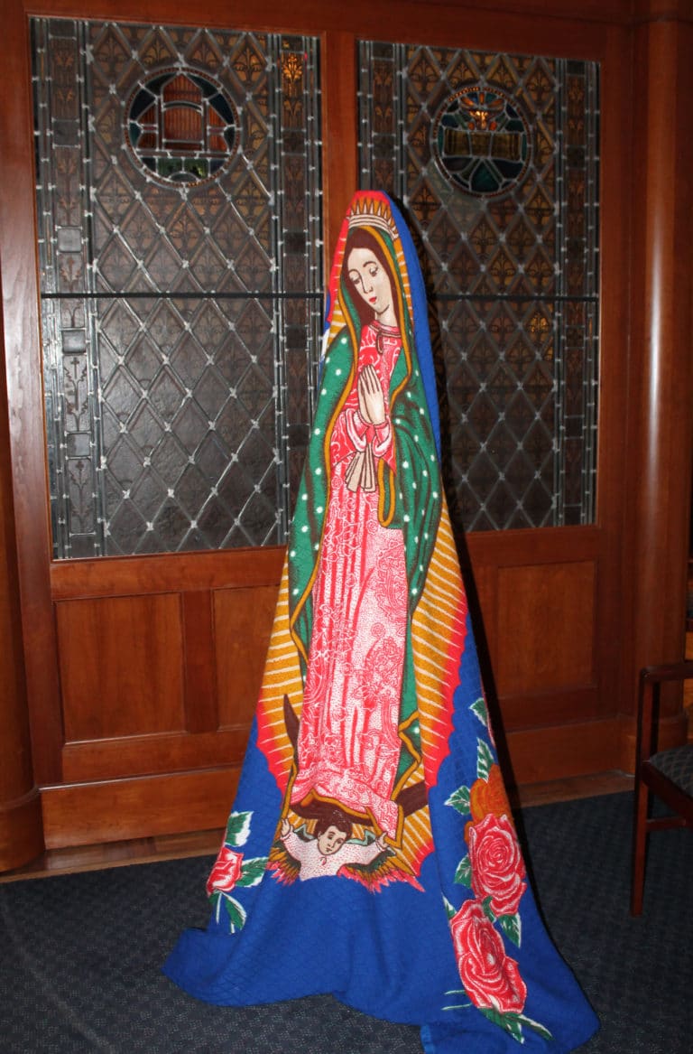This blanket featuring Our Lady of Guadalupe was set up at the Motherhouse Chapel entrance. It is owned by Sister Fran Wilhelm, who helped serve Hispanics in the Owensboro area for many years.