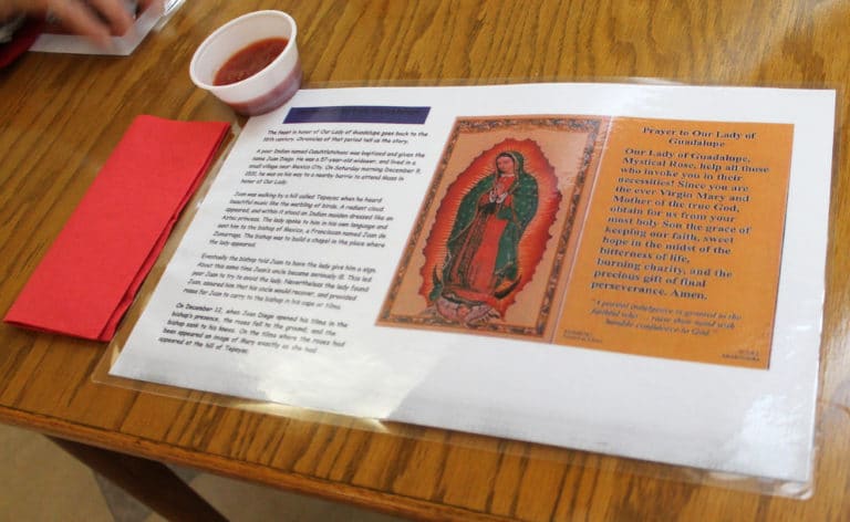 The placemats in the dining room explained the story of Our Lady of Guadalupe. There were also chips and salsa on each table.