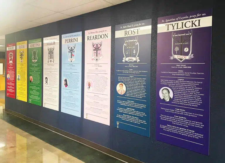 The eight “herd legends” of Bishop Miege High School are honored with these 6-foot plaques in the school. The eight “herd legends” of Bishop Miege High School are honored with these 6-foot plaques in the school.