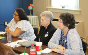 Charlotte Hollis, left, of Our Lady of Lourdes Parish in Owensboro; Sister Nancy Murphy, center, secretary to the Leadership Council at Mount Saint Joseph; and Ellen Anderson, of St. Thomas More Parish in Paducah, Ky., talk about their expectations of the day. Hollis said she was preparing for her parish having first Communion in the coming week.