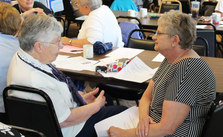 Sister Ruth Gehres, left, chats with Associate Lois Bell of Paducah, Ky.