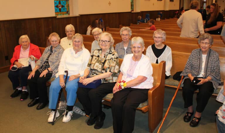 Several Ursuline Sisters joined Sister Mary Celine for morning Mass at St. William Church and then a reception in the school gym. In the first row, from left, are Sisters Catherine Kaufman, Marie Joseph Coomes, Karla Kaelin, Pat Rhoten and Mary Celine; in the second row from left are Sisters Cecelia Joseph Olinger, George Mary Hagan, Nancy Murphy, Ann Patrice Cecil and Margaret Ann Aull.