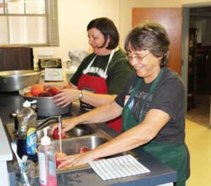 The cleanest peaches north of Georgia were the result of this ace team of Sister Monica Seaton, left, and Sister Jacinta Powers.