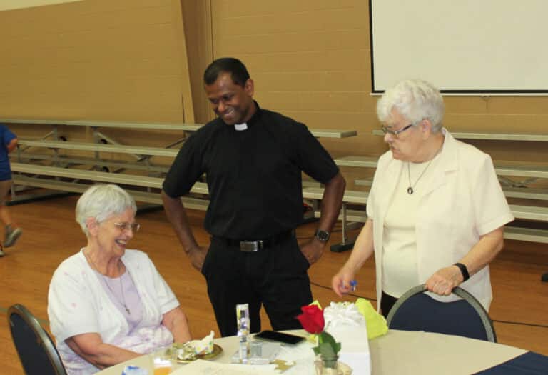 Sister Mary Celine shares a laugh with the pastor, Father Shijo Vadakumkara, and Sister Cecelia Joseph Olinger, who is from Sister Mary Celine’s hometown of Glennonville, Mo.