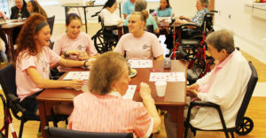 The afternoon wouldn’t be complete without bingo with the sisters in the Rainbow Room of St. Joseph Villa. From left, Abby Carlson, Delaney Hile and Amelia Guenther from Kansas join Sister Clarence Marie Luckett, right, and Genevieve Stelmach.