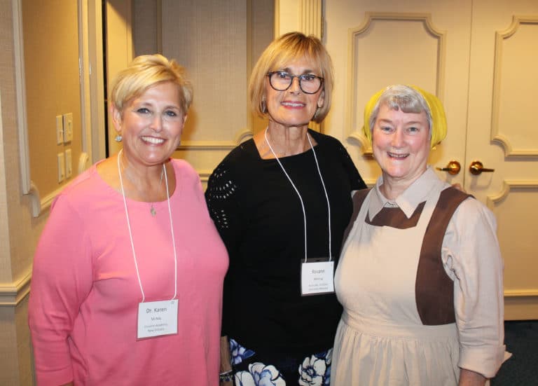 Karen McNay, left, president of Ursuline Academy in New Orleans; Rosann Whiting, center, executive director of the Ursuline Education Network; and Ursuline Sister of Mount Saint Joseph Pam Mueller gather during the reception following the opening ritual. Sister Pam previously served on the board for UEN.