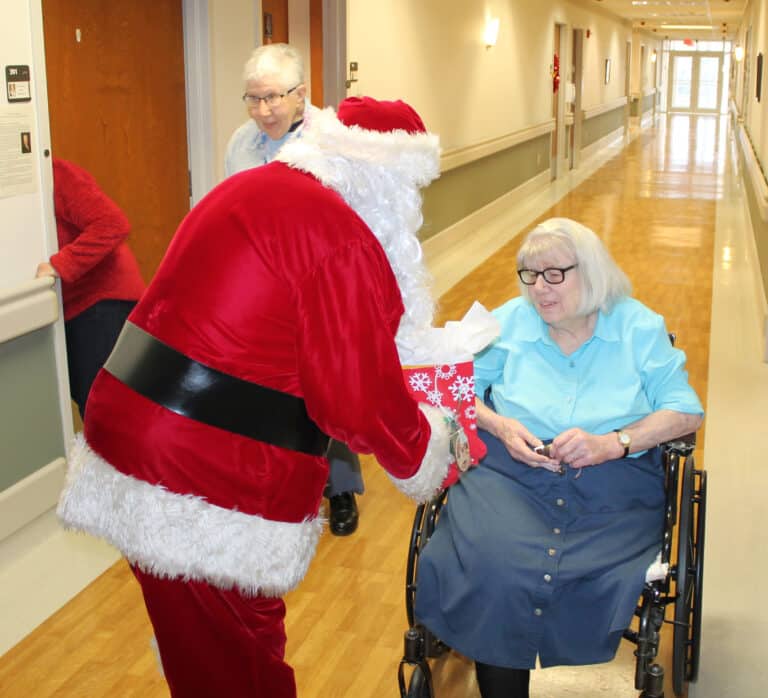 Sister Sheila Ann Smith couldn’t wait, and decided to meet Santa in the hallway.