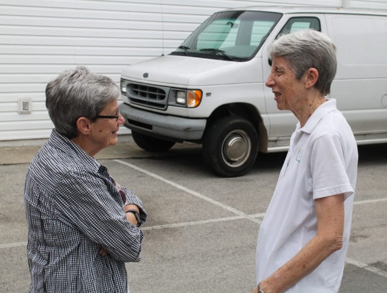 Sister Judith Nell Riney, left, chats with Sister Maureen O’Neill before the festivities began. Sister Maureen has ministered as a caseworker at Sister Visitor for 13 years.