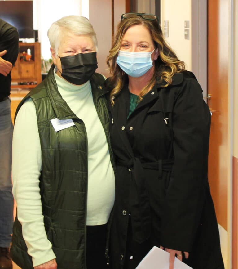 Sister Suzanne Sims, left, director of Local Community Life for the Sisters, and Michelle Roberts, manager of Internal Audit and Accounting Systems for the diocese, reconnect in the hallway. The two knew each other during Sister Suzanne’s time ministering at St. Pius Parish. Sister Suzanne Sims, left, director of Local Community Life for the Sisters, and Michelle Roberts, manager of Internal Audit and Accounting Systems for the diocese, reconnect in the hallway. The two knew each other during Sister Suzanne’s time ministering at St. Pius Parish.