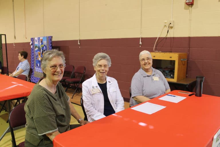 Sister Mary Ellen, Sister Nancy and Sister Ann were in charge of the registration table.